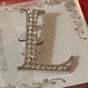 Elegant rhinestone letter “L” brooch Silver tone